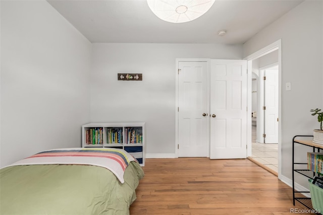 1800 Grove St, Denver, CO 80204 - bedroom featuring wood finished floors and baseboards