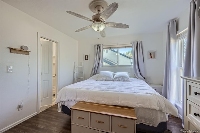 10064 Owens St, Broomfield, CO 80021 - bedroom with dark wood-style floors, baseboards, and ceiling fan