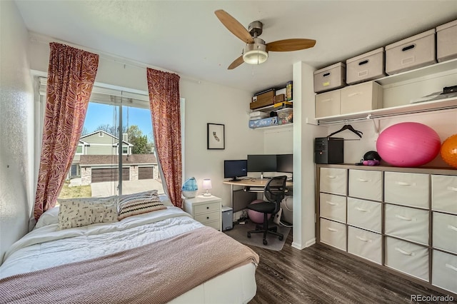 10064 Owens St, Broomfield, CO 80021 - bedroom featuring dark wood-type flooring, a desk, a ceiling fan, and baseboards