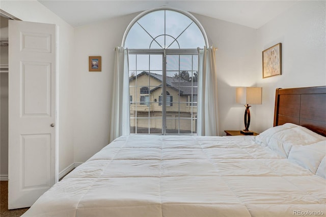 bedroom with vaulted ceiling