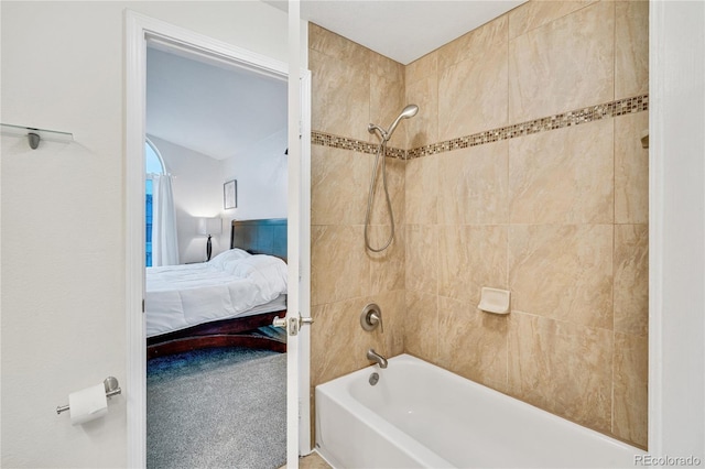 ensuite bathroom featuring shower / bath combination