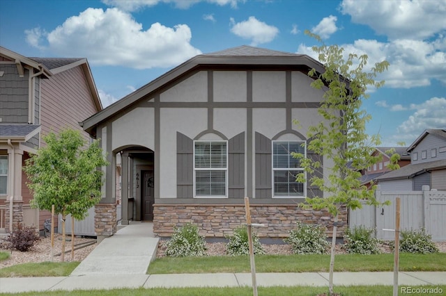 6612 N Ceylon St, Denver, CO 80249 - view of front of home featuring stone siding and stucco siding