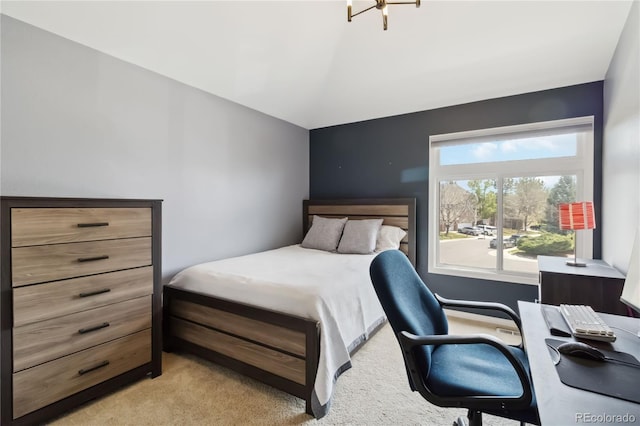 bedroom featuring light colored carpet, an office area, and lofted ceiling