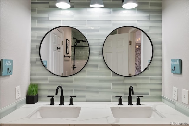 full bath with decorative backsplash and double vanity