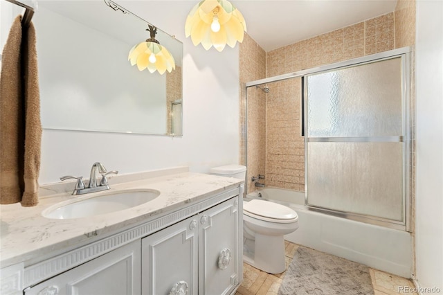 708 Revere St, Aurora, CO 80011 - full bathroom with vanity and bath / shower combo with glass door