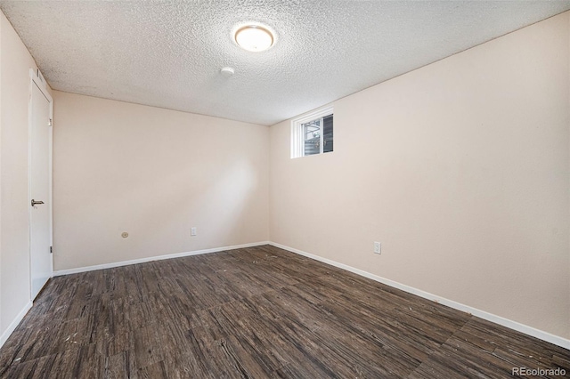 12662 W Virginia Ave, Lakewood, CO 80228 - unfurnished room with a textured ceiling, wood finished floors, and baseboards