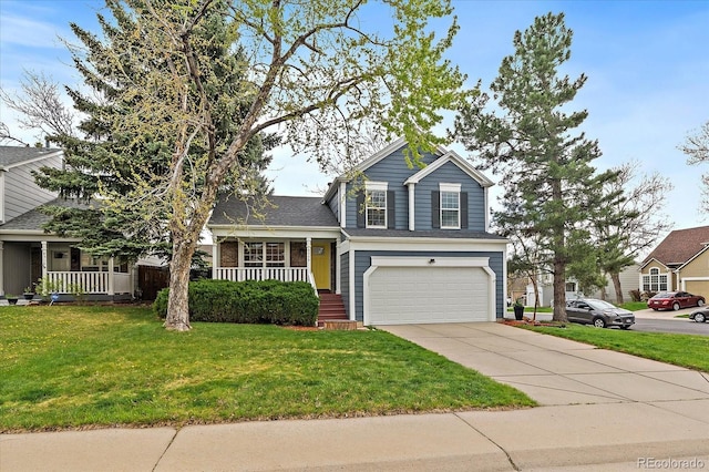 tri-level home with a porch, a front lawn, an attached garage, and driveway