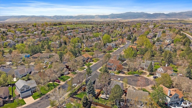 bird's eye view featuring a residential view and a mountain view