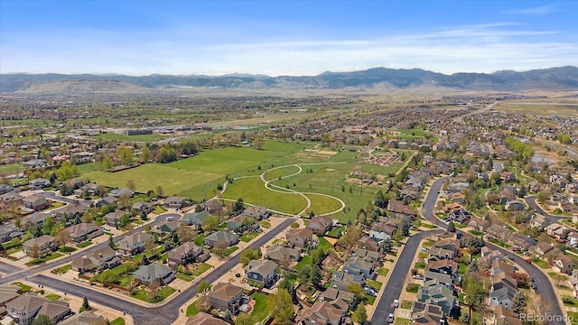 bird's eye view with a residential view and a mountain view