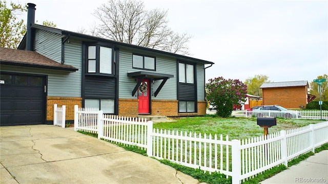 1528 Coronado Pkwy, Denver, CO 80229 - view of front facade featuring brick siding, a fenced front yard, an attached garage, and concrete driveway