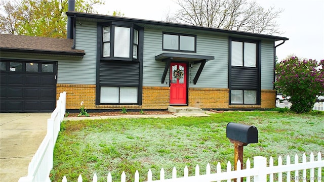 1528 Coronado Pkwy, Denver, CO 80229 - view of front of property featuring brick siding, an attached garage, and driveway