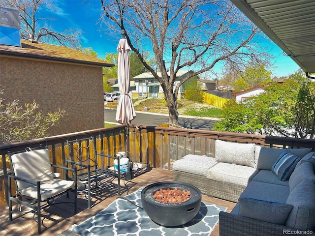 1528 Coronado Pkwy, Denver, CO 80229 - wooden terrace with an outdoor living space with a fire pit
