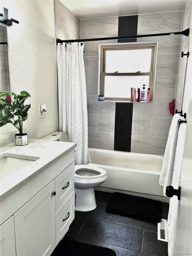 1528 Coronado Pkwy, Denver, CO 80229 - bathroom with vanity and shower / bath combo with shower curtain