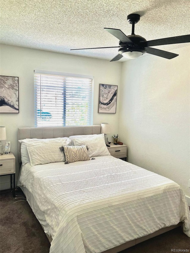 1528 Coronado Pkwy, Denver, CO 80229 - bedroom featuring carpet floors, a ceiling fan, and a textured ceiling