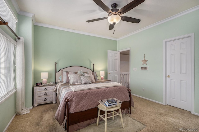 bedroom featuring ceiling fan, carpet floors, ornamental molding, and baseboards