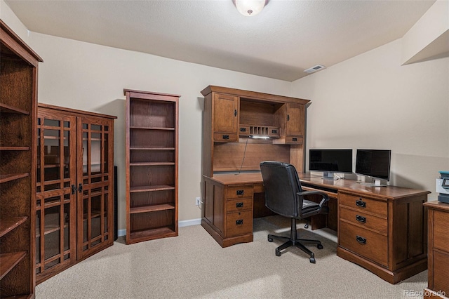 office featuring carpet, visible vents, and baseboards