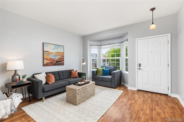 5733 S Yakima Way, Aurora, CO 80015 - living room with light wood finished floors and baseboards