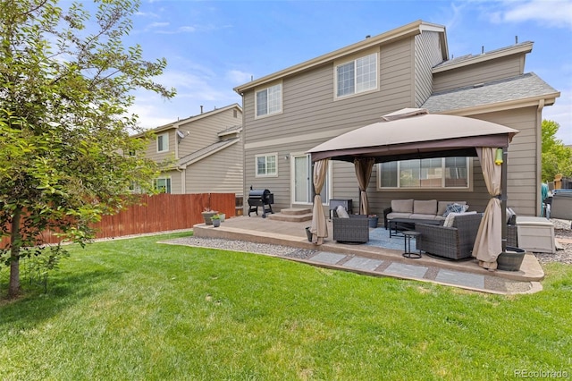 5733 S Yakima Way, Aurora, CO 80015 - back of house featuring an outdoor hangout area, a gazebo, and a patio
