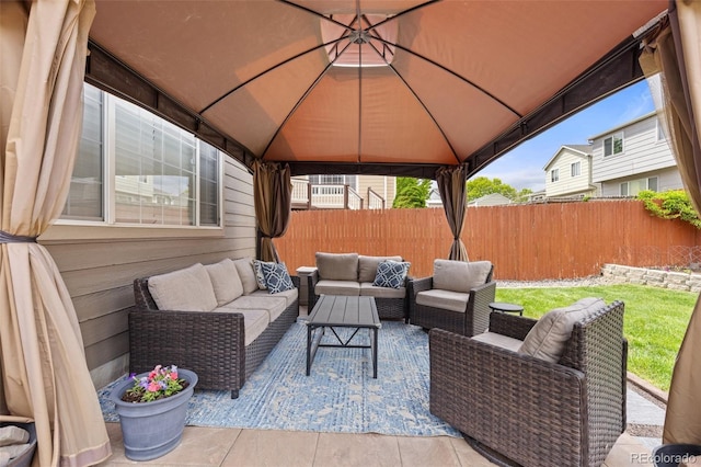 5733 S Yakima Way, Aurora, CO 80015 - fenced backyard featuring a gazebo, an outdoor living space, and a patio