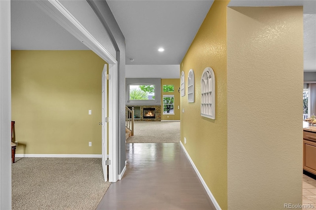 20532 E Lake Cir, Centennial, CO 80016 - corridor featuring a textured wall, baseboards, light colored carpet, and recessed lighting