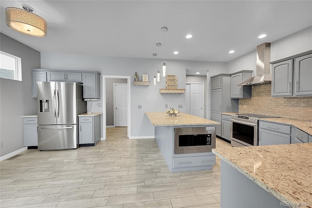 20532 E Lake Cir, Centennial, CO 80016 - kitchen featuring appliances with stainless steel finishes, wall chimney exhaust hood, gray cabinetry, baseboards, and recessed lighting