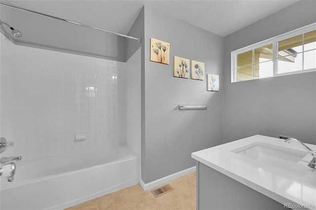 20532 E Lake Cir, Centennial, CO 80016 - full bath featuring tile patterned flooring, shower / tub combination, vanity, and baseboards