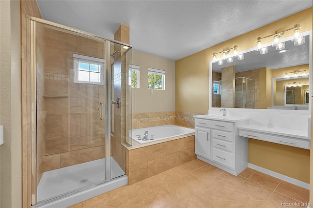 20532 E Lake Cir, Centennial, CO 80016 - bathroom featuring a garden tub, vanity, a shower stall, and tile patterned flooring