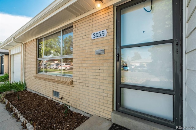 3055 Carson St, Aurora, CO 80011 - view of exterior entry with brick siding