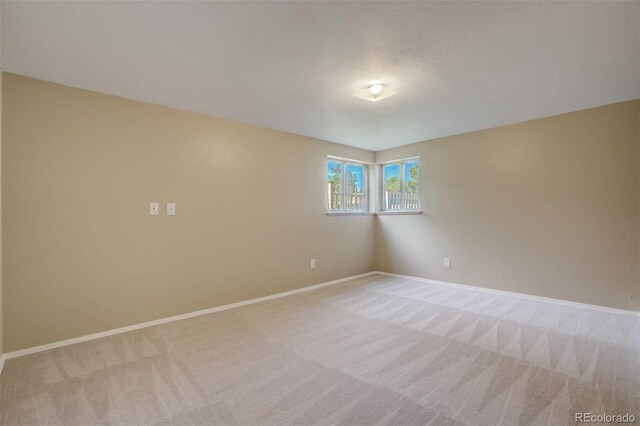3055 Carson St, Aurora, CO 80011 - empty room with light carpet and baseboards