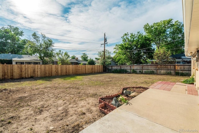 3055 Carson St, Aurora, CO 80011 - view of yard featuring a patio