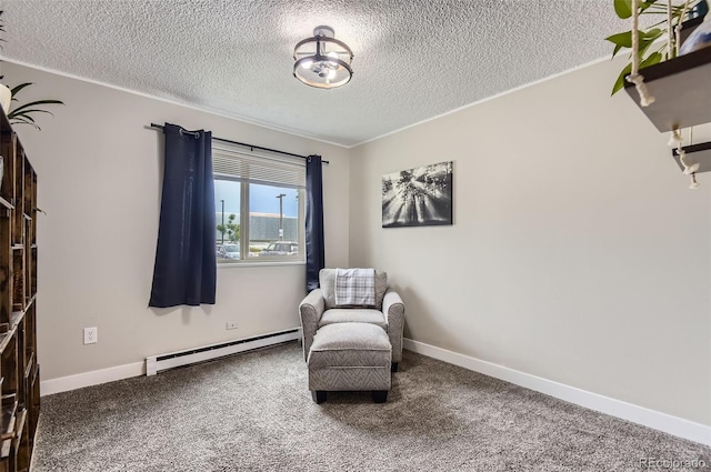 2280 S Oswego Way Unit 104, Aurora, CO 80014 - sitting room featuring a baseboard heating unit, a textured ceiling, carpet, and ornamental molding