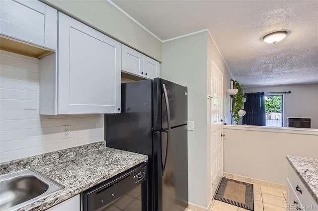 2280 S Oswego Way Unit 104, Aurora, CO 80014 - kitchen featuring black appliances, white cabinets, a textured ceiling, backsplash, and light stone countertops