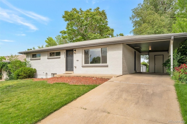 8280 Auburn Ln, Westminster, CO 80031 - single story home featuring brick siding, driveway, and a front yard