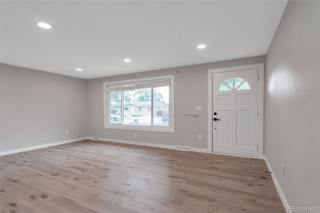 8280 Auburn Ln, Westminster, CO 80031 - entryway featuring healthy amount of natural light, wood finished floors, and recessed lighting