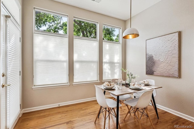 2870 W Riverwalk Cir Unit B, Littleton, CO 80123 - dining room with light wood finished floors