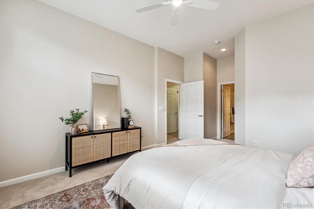 2870 W Riverwalk Cir Unit B, Littleton, CO 80123 - carpeted bedroom featuring baseboards and a ceiling fan