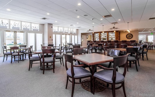 2870 W Riverwalk Cir Unit B, Littleton, CO 80123 - carpeted dining area featuring french doors and recessed lighting