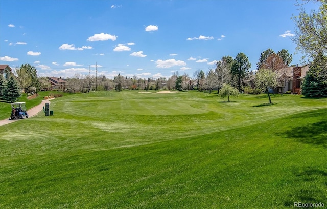 2870 W Riverwalk Cir Unit B, Littleton, CO 80123 - view of community with view of golf course and a lawn