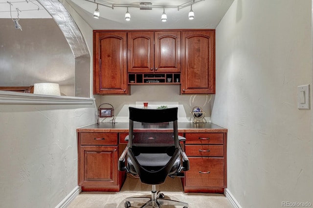 office featuring baseboards