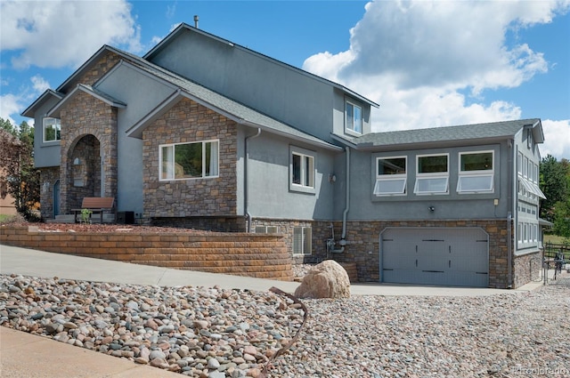 view of front of home with a garage