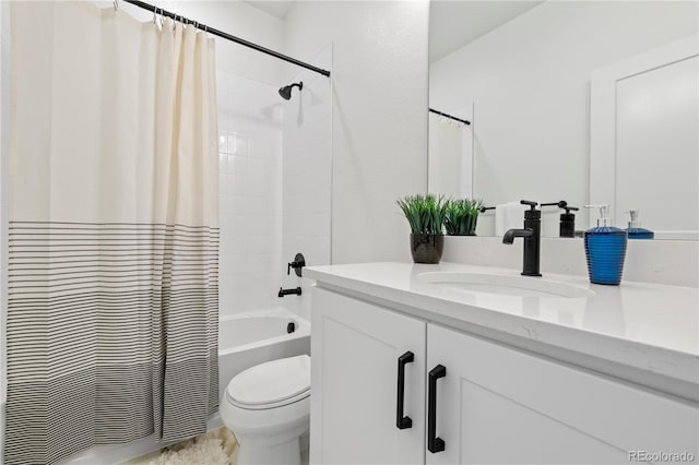 full bath with toilet, vanity, and shower / tub combo with curtain