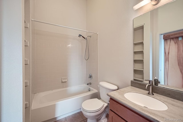 bathroom with vanity, toilet,  shower combination, and tile patterned floors