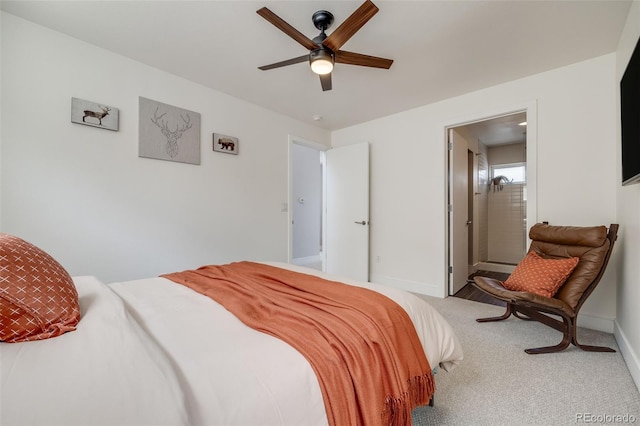 carpeted bedroom with baseboards and a ceiling fan