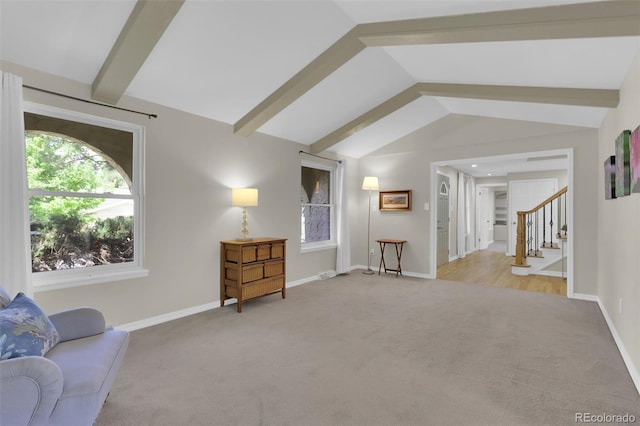 7504 E Jefferson Dr, Denver, CO 80237 - living room featuring light carpet, stairs, and baseboards