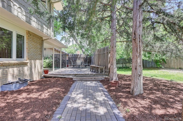 7504 E Jefferson Dr, Denver, CO 80237 - wooden deck with a fenced backyard