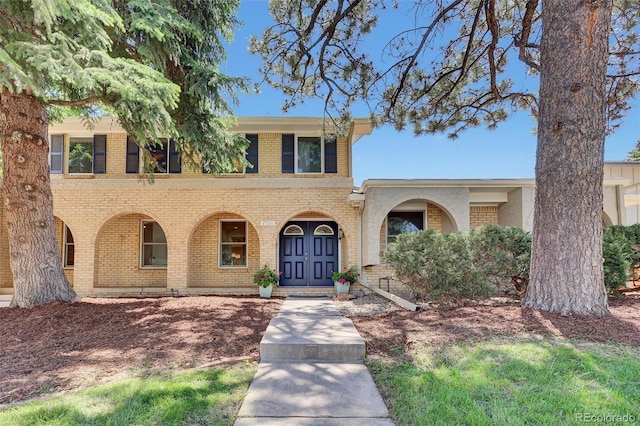 7504 E Jefferson Dr, Denver, CO 80237 - view of front of property with brick siding and covered porch