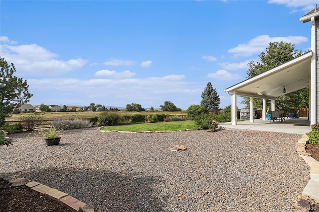 view of yard with a patio area