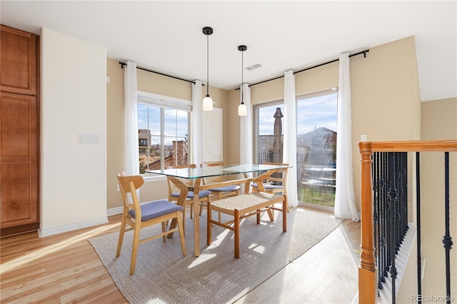 dining room featuring light hardwood / wood-style flooring