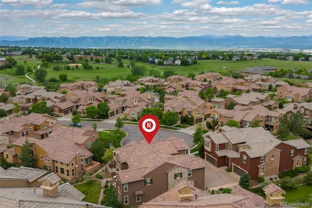 9228 Sori Ln, Highlands Ranch, CO 80126 - aerial perspective of suburban area with a mountain backdrop