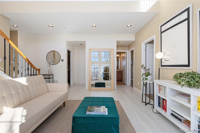 9228 Sori Ln, Highlands Ranch, CO 80126 - living area with recessed lighting, baseboards, and stairs